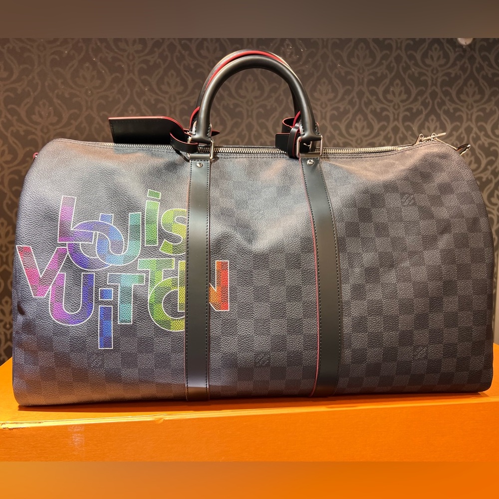 LOUIS VUITTON
KEEPALL BANDOULIERE 45
